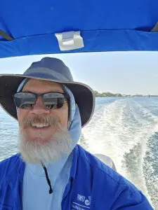 Dr. Schwartz on a boat. 